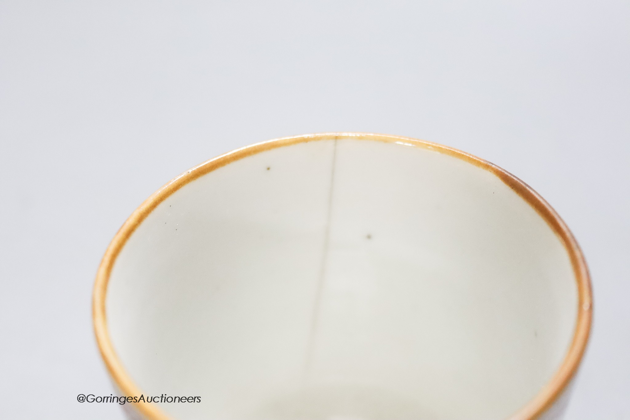 Three Chinese export coffee cups and a similar salt cellar, 18th century